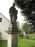 Senomaty, socha svatého Judy Tadeáše u mostu přes Rakovnický potok.jpg