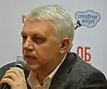 Novinář Pavel Šeremet zahynul v Kyjevě v červenci 2016 po explozi automobilu[2]
