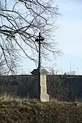 Side view of Wayside cross from 1818 near Vícenice u Náměště nad Oslavou, Třebíč District.jpg