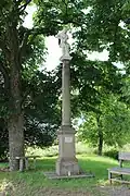 Skřivaň, sloup se sochou svatého Isidora.jpg
