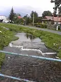 Slavkovský potok protékající obcí