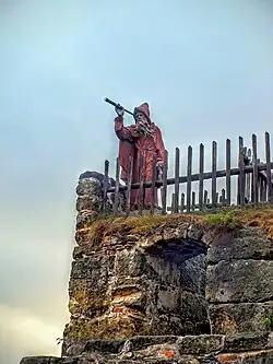 Socha poustevníka Samuela Görnera na vyhlídce skalního hradu Sloup