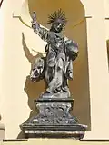 socha Spasitele v hlavním průčelí kostela sv. Michala v Olomouci