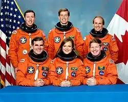 Zleva stojí Baker, Wetherbee, Maclean, sedí Veach, Jerniganová, Shepherd