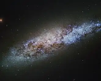 Trpasličí spirální galaxie NGC 4605