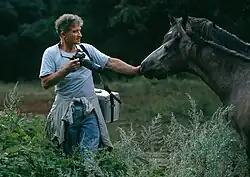 Tomáš Míček s koněm, oblíbeným námětem svých fotografií