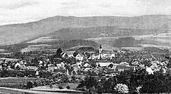 Ves Touchořiny s kostelem sv. Prokopa, zbořeným v roce 1978