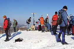 Sraz turistů na vrcholu