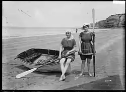 Two women in bathing costumes