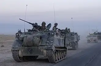 Jednotky 1. pěší divize americké armády během války v Iráku v říjnu 2004