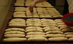 Posypání rohlíku mákem 9/12