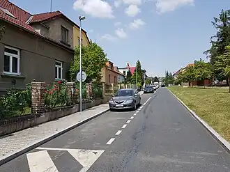 Pohled od jihu z ulice Mochovská