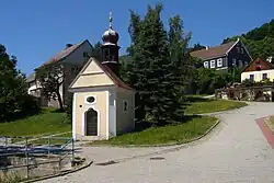 Náves s kaplí Nejčistšího srdce Panny Marie