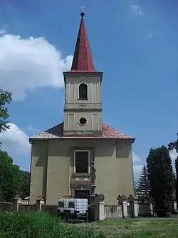 Kostel sv. Mikuláše v severní části vsi při silnici do Heřmanic u Oder. Současná stavba postavena na místě staršího kostela v roce 1807.