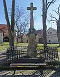 Kamenný kříž na návsi z roku 1818