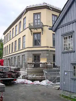Stavba Wessels gate v Oslo 1865, znovu postaveno roku 2000