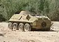 Opuštěné a rezavějící BTR-60PB ve vesnici v afghánské provincii Orúzgán.