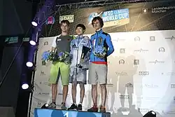Čchon Čong-won vítěz SP 2015 v boulderingu, Mnichov (s 2. Janem Hojerem a 3. Adamem Ondrou)