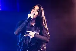 Ambre Vourvahis na koncertě v Hellraiser-Leipzig v Lipsku v roce 2023