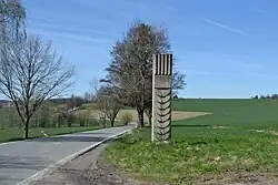 Hraniční pilíř u odbočky na Zbinohy