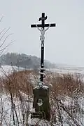 Kříž poblíž Zlučína u zrušené cesty do Předbořic