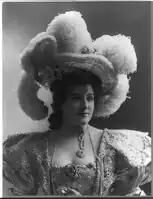 Lillian Russell, 1861-1922, bust portrait, facing right, wearing plumed hat
